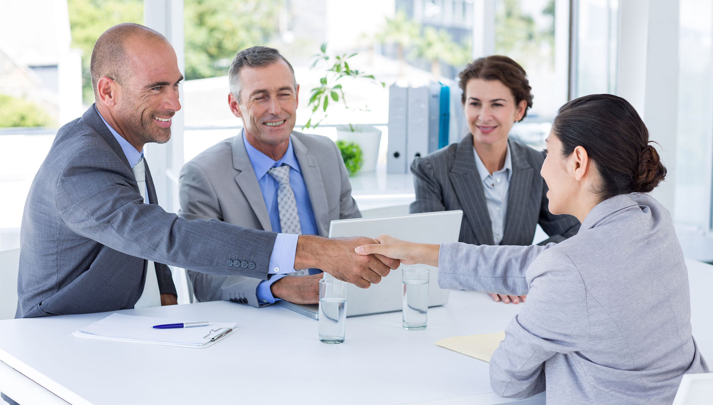 Interview panel listening to an applicant